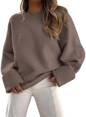 Woman wearing an oversized fuzzy chunky warm crewneck pullover sweater with ribbed cuffs and hem